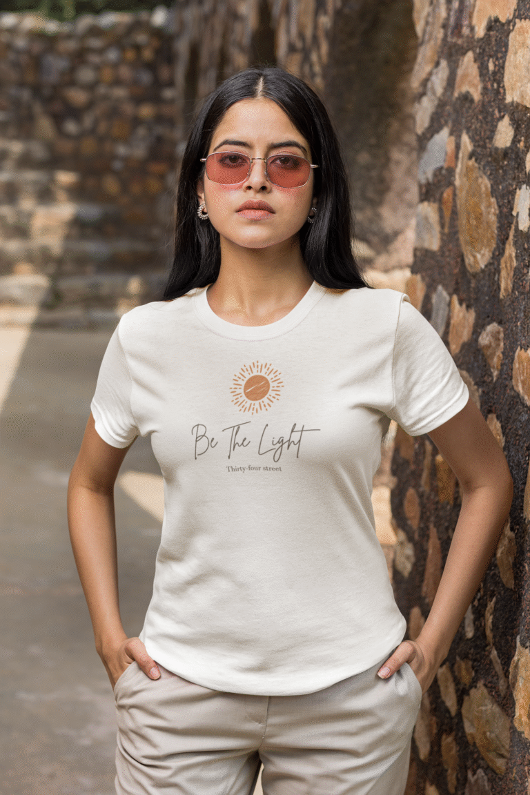 basic-t-shirt-mockup-featuring-a-serious-woman-with-sunglasses-with-her-hands-in-her-pockets-m26378