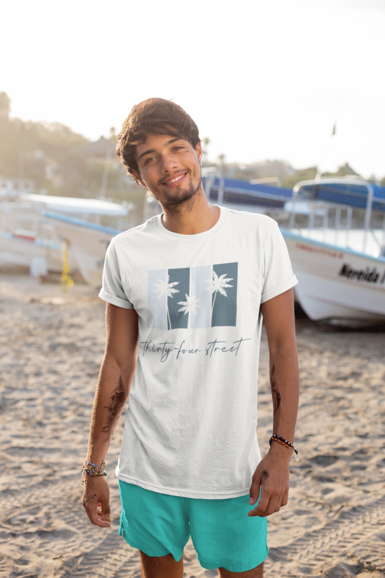 t-shirt-mockup-of-a-slim-tattooed-man-at-the-beach-26751