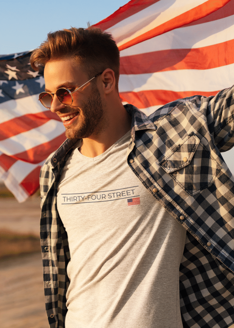 t-shirt-mockup-of-a-stylish-man-holding-an-american-flag-45789-r-el2